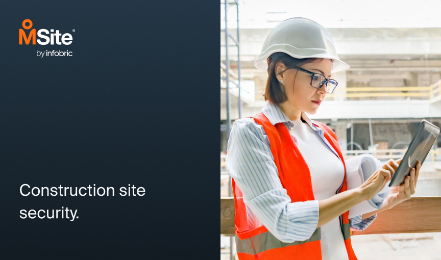 construction worker onsite looking at an ipad to check dashboards