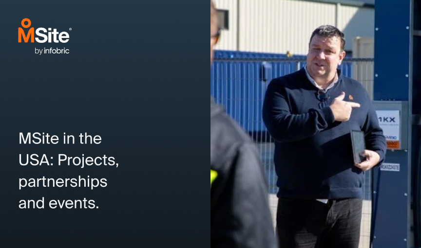 Nick Wilkinson in America at psg talking to construction workers outside of a pod